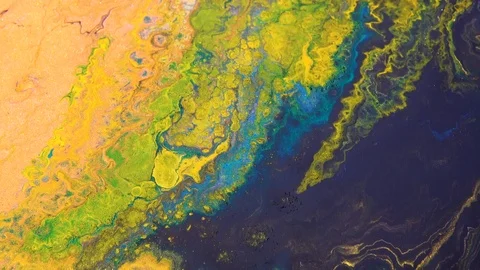 Abstract color background from liquid paints close-up 動画素材 121664190