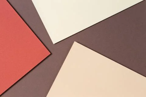 Abstract color papers geometry composition background with beige, coral and Stock Photos