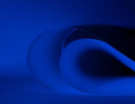 Abstract colored background, created with curved dark blue paper sheets. Stock Photos