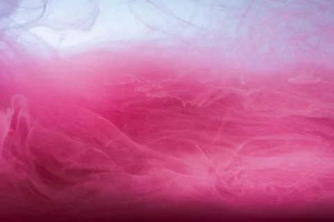 Abstract colored background. Pink smoke, ink in water, the patterns of the Stock Illustration