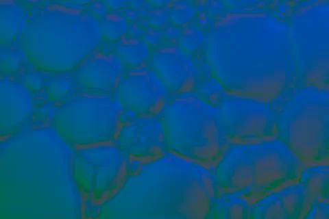 Abstract colored background, soap bubbles on the water surface. Micro texture Stock Photos