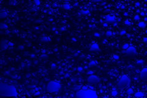 Abstract colored background, soap bubbles on the water surface. Micro texture Stock Photos