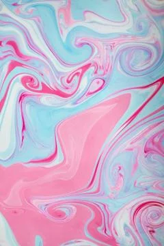 Abstract colored background. Stains of paint on the water. Ebru art, marbled Stock Photos