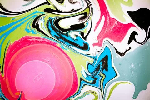 Abstract colored background. Stains of paint on the water. Ebru art, marbled Stock Photos