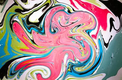 Abstract colored background. Stains of paint on the water. Ebru art, marbled Stock Photos