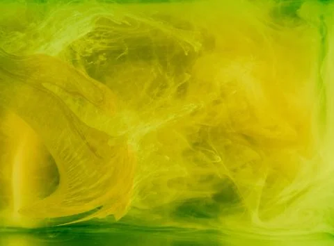 Abstract colored background. Yellow smoke, ink in water, the patterns of the Stock Illustration
