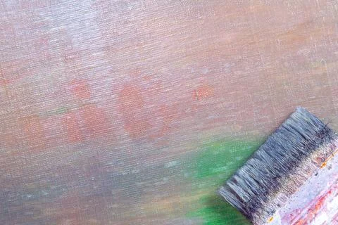 Abstract colored creative background - rough linen canvas unevenly covered wi Stock Photos