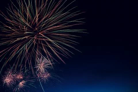 Abstract colored firework background with free space for text 写真素材