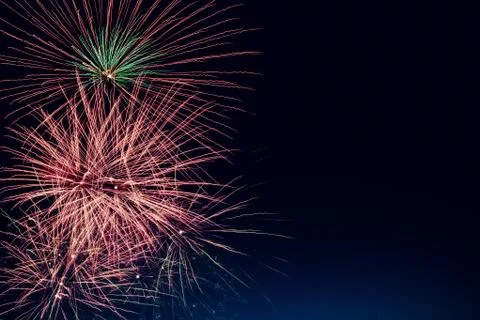 Abstract colored firework background with free space for text 写真素材