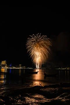 Abstract colored firework background light up the sky with dazzling display Stock Photos