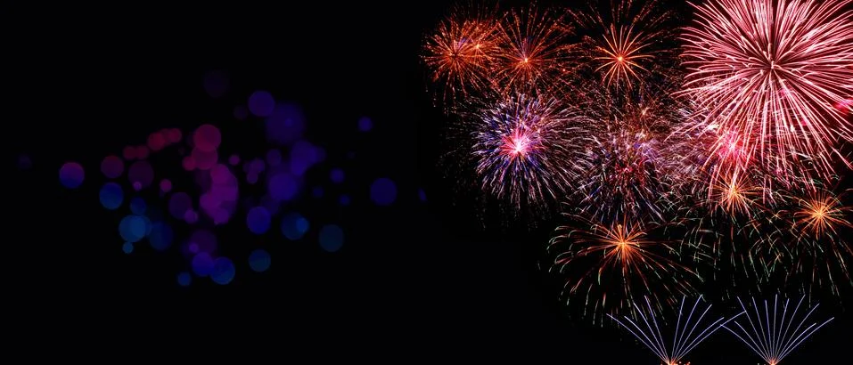 Abstract colored firework on dark sky. Celebration and anniversary concept Stockfoto's
