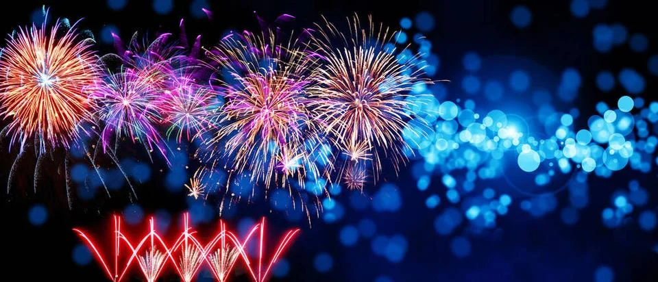 Abstract colored firework on dark sky. Celebration and anniversary concept... Stock Photos