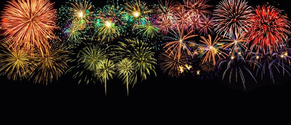 Abstract colored firework on dark sky. Celebration and anniversary concept... Stockfoto's