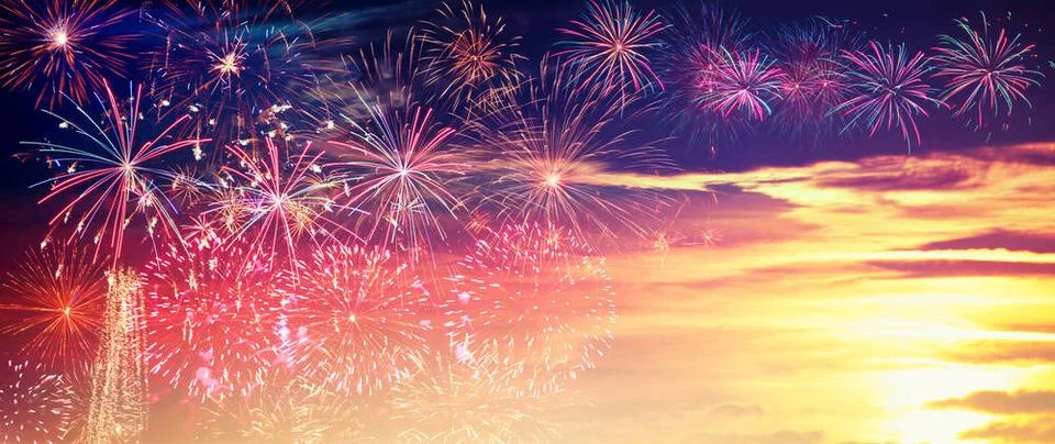 Abstract colored firework on dark sky. Celebration and anniversary concept... Stockfoto's