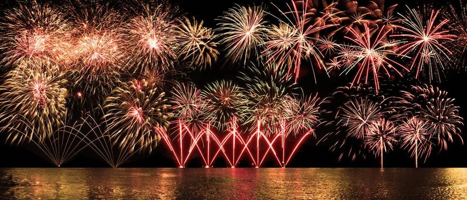 Abstract colored firework on dark sky. Celebration and anniversary concept... Stock Photos
