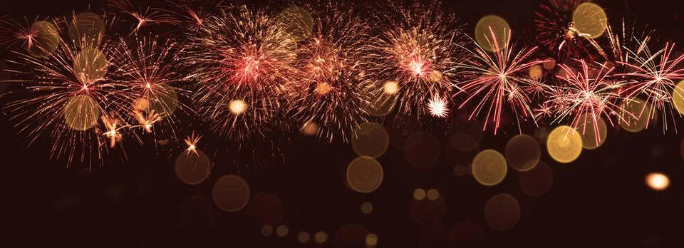 Abstract colored firework on dark sky. Celebration and anniversary concept... Stockfoto's