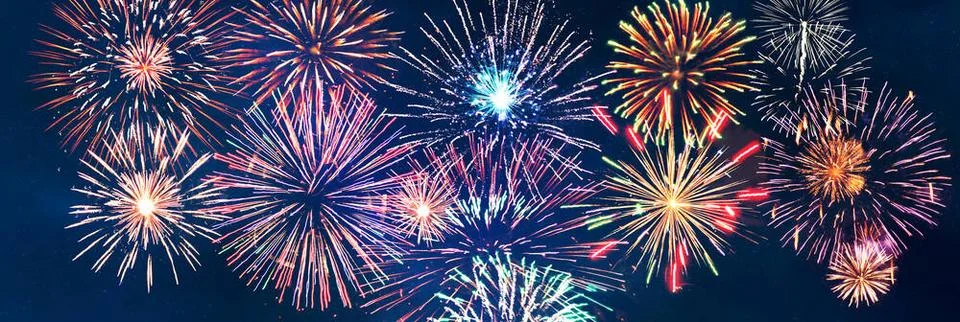 Abstract colored firework on dark sky. Celebration and anniversary concept... Stock Photos