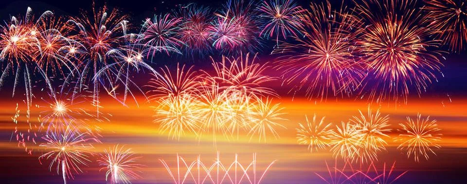 Abstract colored firework on dark sky. Celebration and anniversary concept... Foto stock