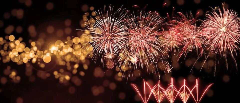 Abstract colored firework on dark sky. Celebration and anniversary concept... Stockfoto's