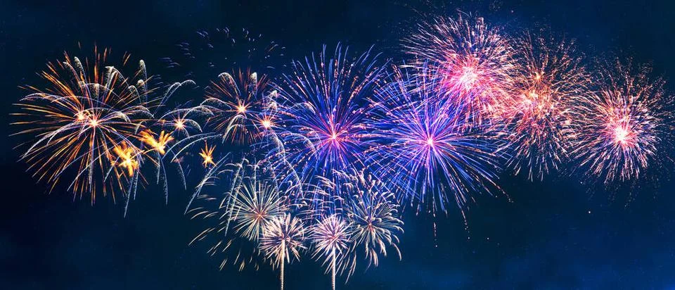Abstract colored firework on dark sky. Celebration and anniversary concept... Foto stock