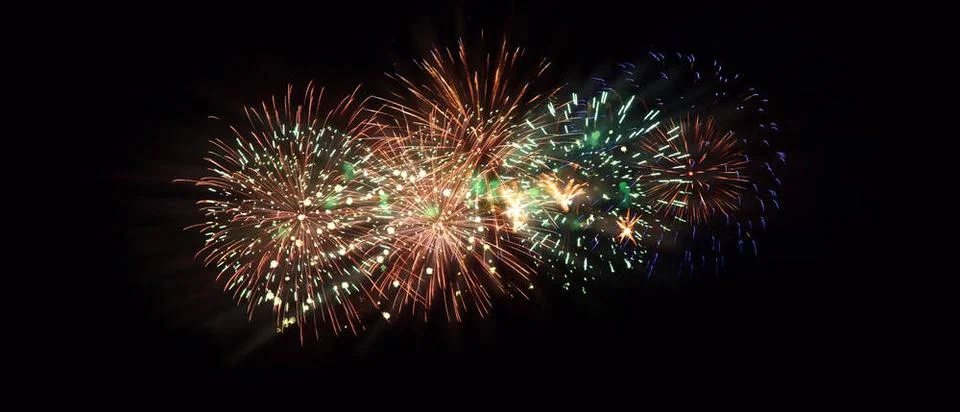 Abstract colored firework on dark sky. Celebration and anniversary concept... Foto stock