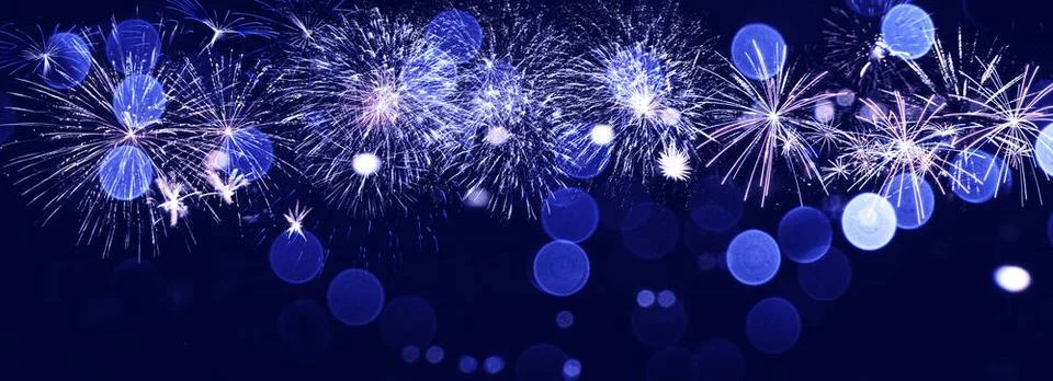 Abstract colored firework on dark sky. Celebration and anniversary concept... Stockfoto's