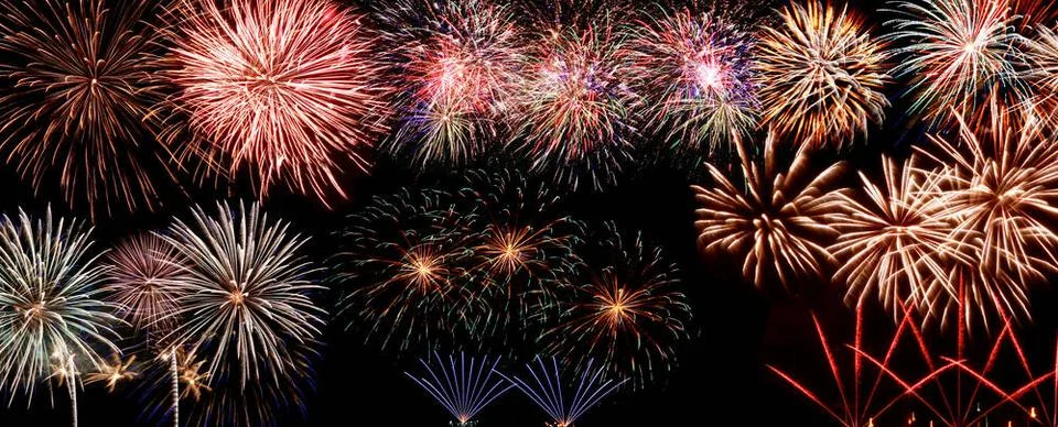 Abstract colored firework on dark sky. Celebration and anniversary concept... Foto stock