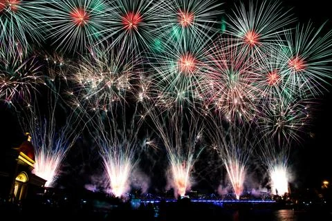 Abstract colored firework new year festival night sky background. Stock Photos