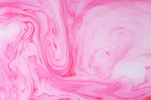 Abstract colored marble background. Stains of paint on the water. Stock Photos
