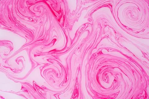 Abstract colored marble background. Stains of paint on the water. Stock Photos