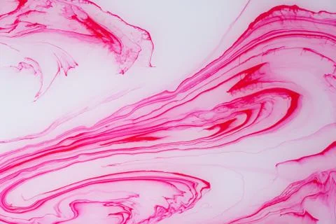 Abstract colored marble background. Stains of paint on the water. Stock Photos