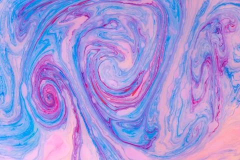Abstract colored marble background. Stains of paint on the water. Stock Photos