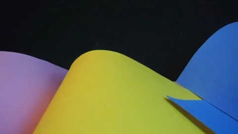 Abstract colored paper shapes moving slowly Stock Footage 328525643