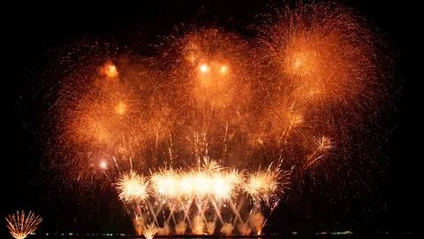 Abstract colored real firework background with big shining glowing fireworks  Stock Photos