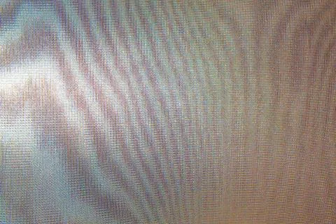 Abstract colored wavy background of interference overlay fine meshes, combina Stock Photos