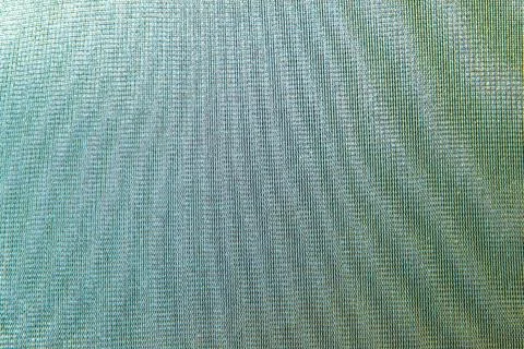 Abstract colored wavy background of interference overlay fine meshes, combina Stock Photos