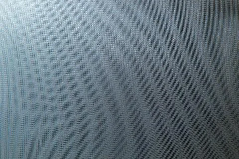 Abstract colored wavy background of interference overlay fine meshes, combina Stock Photos