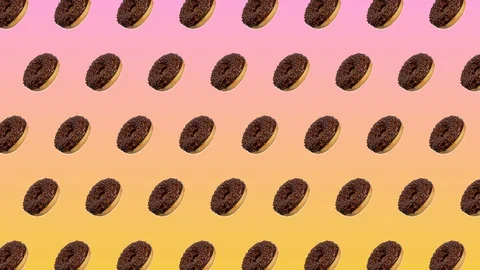 Abstract colorful animation - side view donuts with chocolate move to the sid Stock Footage 129080449