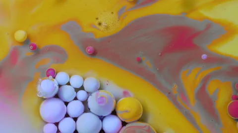 Abstract colorful bubbles. Macro colors, paint in dynamic flow. Stock Footage 133678329