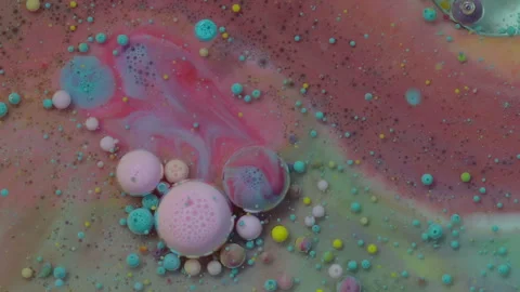 Abstract colorful bubbles. Macro colors, paint in dynamic flow. Stock Footage 133678962