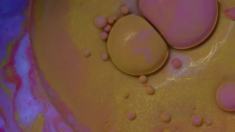 Abstract colorful bubbles. Macro colors, paint in dynamic flow. Stock Footage 133679489