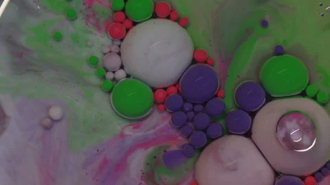 Abstract colorful bubbles. Macro colors, paint in dynamic flow. Stock Footage 133680556