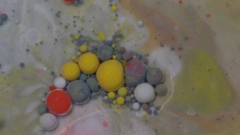 Abstract colorful bubbles. Macro colors, paint in dynamic flow. Stock Footage 133682316