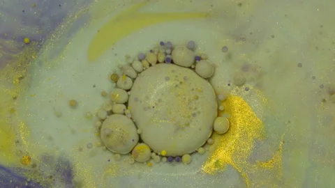 Abstract colorful bubbles. Macro colors, paint in dynamic flow. Stock Footage 133684037