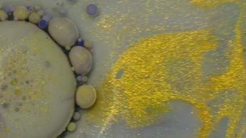 Abstract colorful bubbles. Macro colors, paint in dynamic flow. Stock Footage 133684060