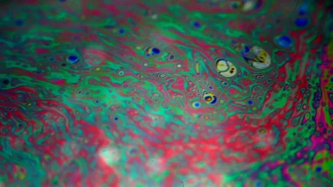 Abstract colorful fluid background of vibrant neon colors and patterns 库存影片 95480917