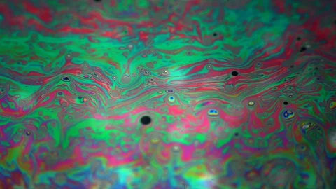 Abstract colorful fluid background of vibrant neon colors and patterns 库存影片 95483023