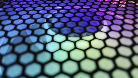 Abstract colorful hexagon mesh background with glowing neon rainbow lights. Stock-Footage 345557974