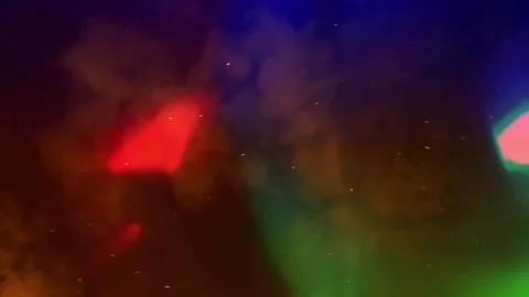 Abstract Colorful Light Particles Floating in Dark Space with Glowing Haze and Video stock 338439294