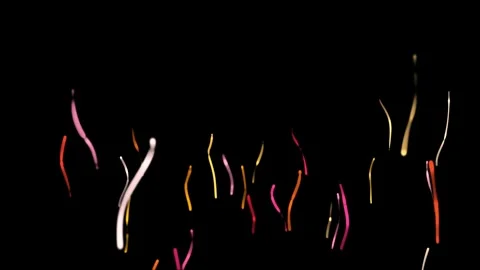 Abstract colorful particles exploding from bottom of screen on black backgrou Stock Footage 327529560